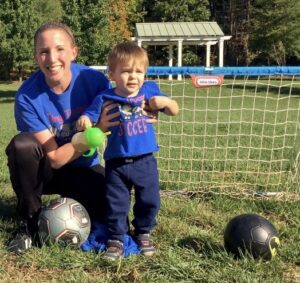 tiny troops soccer coach and player with special needs